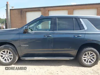 2021 Chevrolet Tahoe LT z VIN 1GNSKNKD4MR250981, wystawiony jako IAAI lot #42092550 z przebiegiem 89 414 mil mil oraz . Historia ofert i sprzedaży dostępna na DreamBid. Obrazek 14.
