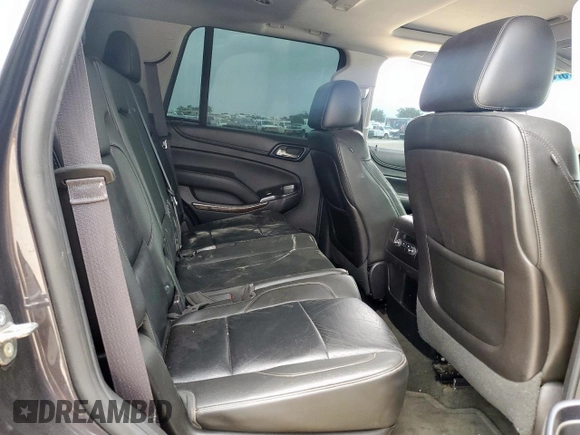 2015 Chevrolet Tahoe LT with VIN 1GNSKBKC1FR139281, listed as a Copart auction lot 57583595 with 142,090 mi miles and Salvage title. Bid and sale history available at DreamBid. Image 11.