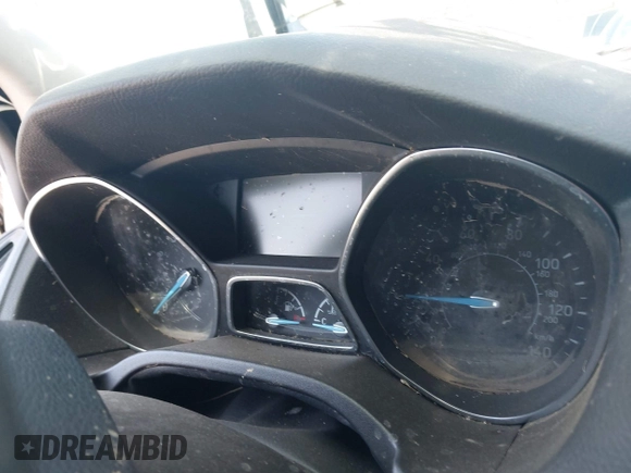 2018 Ford Focus SE z VIN 1FADP3FE9JL303933, wystawiony jako IAAI lot #42530171 z przebiegiem Nie podano mil oraz . Historia ofert i sprzedaży dostępna na DreamBid. Obrazek 7.