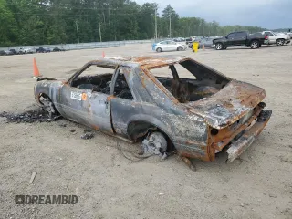 1987 Ford Mustang with VIN 1FABP41A5HF135072, listed as a Copart auction lot 57586605 with Not provided miles and Salvage title. Bid and sale history available at DreamBid. Image 2.