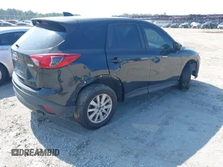 2014 Mazda CX-5 Sport z VIN JM3KE2BE2E0325715, wystawiony jako IAAI lot #42683243 z przebiegiem 262 005 mil mil oraz . Historia ofert i sprzedaży dostępna na DreamBid. Obrazek 4.
