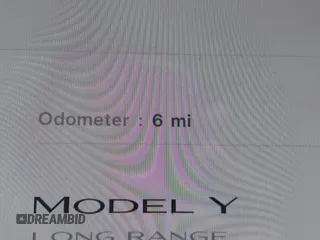 2025 Tesla Model Y Long Range with VIN 7SAYGDED0SA357488, listed as a IAAI auction lot 41550514 with 6 mi miles and . Bid and sale history available at DreamBid. Image 7.