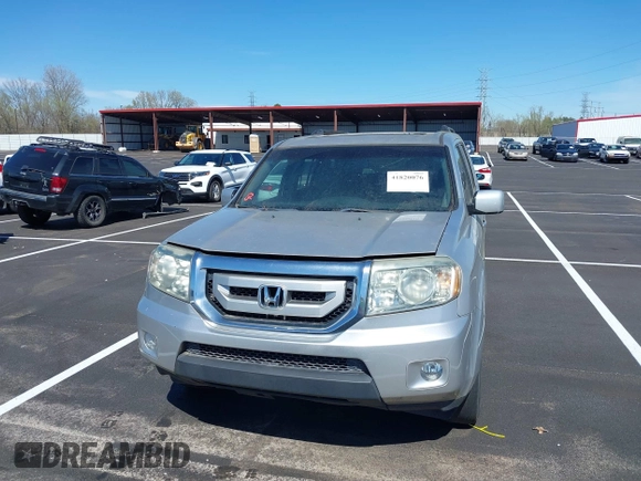 2011 Honda Pilot EX-L with VIN 5FNYF3H6XBB055684, listed as a IAAI auction lot 41820076 with 227,655 mi miles and . Bid and sale history available at DreamBid. Image 12.