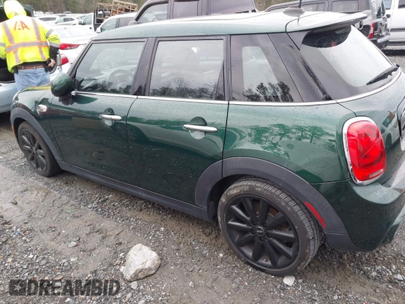 2016 MINI Cooper Hardtop 4 Door S with VIN WMWXU3C58G2D31595, listed as a IAAI auction lot 41267547 with 145,191 mi miles. Bid and sale history available at carsss.com. Image 14.