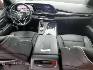 2021 Cadillac Escalade Sport z VIN 1GYS3FKL9MR226155, wystawiony jako Copart lot #55998785 z przebiegiem 96 725 mil mil oraz Szkody całkowita. Historia ofert i sprzedaży dostępna na DreamBid. Obrazek 8.