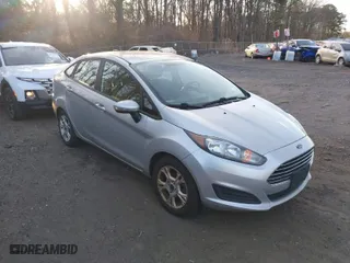 2015 Ford Fiesta SE with VIN 3FADP4BJXFM204584, listed as a IAAI auction lot 41622923 with 142,773 mi miles. Bid and sale history available at carsss.com. Image 1.