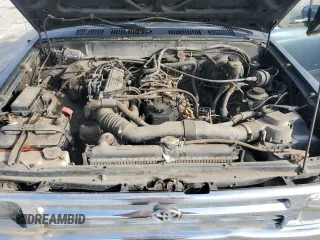 1994 Toyota Pickup z VIN 4TARN93P1RZ213243, wystawiony jako Copart lot #54068005 z przebiegiem 220 450 mil mil oraz Czysty tytuł • Clean title. Historia ofert i sprzedaży dostępna na DreamBid. Obrazek 11.