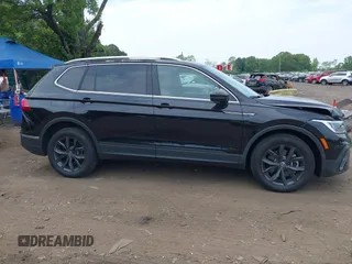 2024 Volkswagen Tiguan SE with VIN 3VVMB7AX6RM079301, listed as a IAAI auction lot 42404572 with 8,573 mi miles and . Bid and sale history available at DreamBid. Image 13.