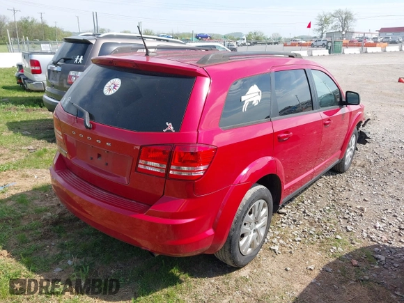 2016 Dodge Journey SE with VIN 3C4PDCAB7GT250093, listed as a IAAI auction lot 42061392 with 100,433 mi miles. Bid and sale history available at carsss.com. Image 4.