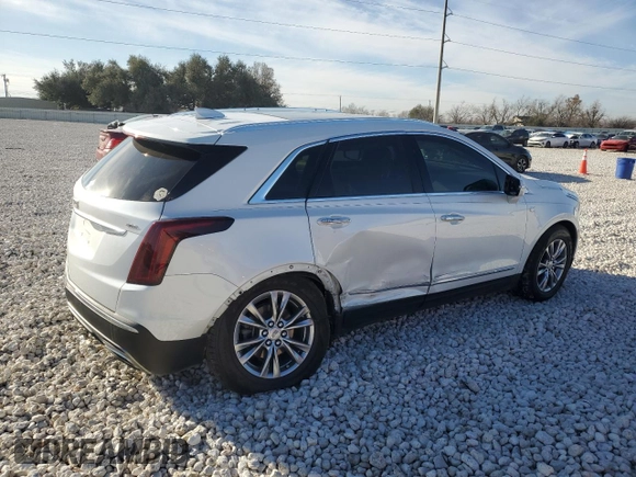2022 Cadillac XT5 FWD Premium Luxury with VIN 1GYKNCRS1NZ125487, listed as a Copart auction lot 42081675 with 67,702 mi miles and Salvage title. Bid and sale history available at DreamBid. Image 3.