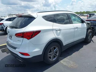 2017 Hyundai Santa Fe 2.4L z VIN 5NMZU3LB9HH034850, wystawiony jako IAAI lot #42342054 z przebiegiem 192 154 mil mil oraz . Historia ofert i sprzedaży dostępna na DreamBid. Obrazek 4.