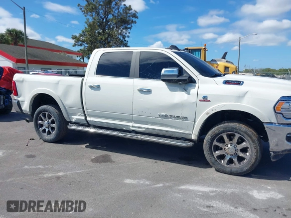 2020 Ram 2500 Longhorn with VIN 3C6UR5GL6LG230556, listed as a IAAI auction lot 38787704 with Not provided miles and . Bid and sale history available at DreamBid. Image 6.