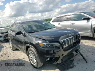 2019 Jeep Cherokee Latitude with VIN 1C4PJLCB9KD269426, listed as a Copart auction lot 58584405 with 132,145 mi miles and Salvage title. Bid and sale history available at DreamBid. Image 13.