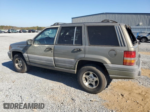 1998 Jeep Grand Cherokee Laredo with VIN 1J4GZ58S5WC165213, listed as a Copart auction lot 77611434 with 168,688 mi miles and Salvage Title. Bid and sale history available at carsss.com. Image 2.