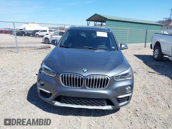 2017 BMW X1 sDrive28i with VIN WBXHU7C37H5H32815, listed as a IAAI auction lot 41837113 with 67,097 mi miles. Bid and sale history available at carsss.com. Image 12.