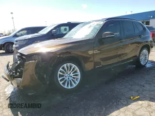 2014 BMW X1 sDrive28i z VIN WBAVM1C57EVW53696, wystawiony jako Copart lot #53142255 z przebiegiem 86 581 mil mil oraz Tytuł czysty. Historia ofert i sprzedaży dostępna na DreamBid. Obrazek 1.