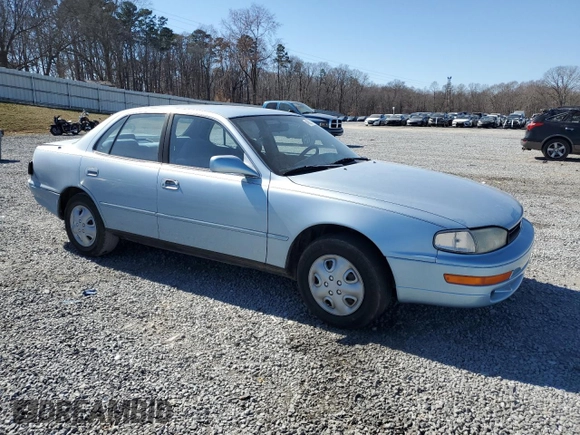 1992 Toyota Camry LE with VIN 4T1SK12E7NU001465, listed as a Copart auction lot 46937175 with 141,334 mi miles and Salvage Title. Bid and sale history available at carsss.com. Image 4.