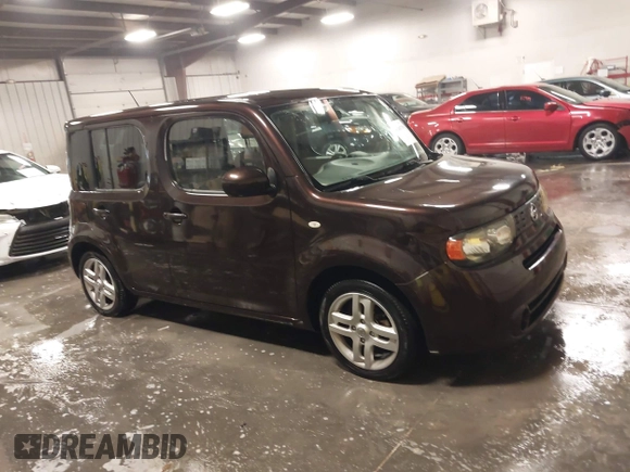 2009 Nissan Cube S z VIN JN8AZ28R39T124465, wystawiony jako IAAI lot #40769739 z przebiegiem 145 993 mil mil oraz . Historia ofert i sprzedaży dostępna na DreamBid. Obrazek 1.