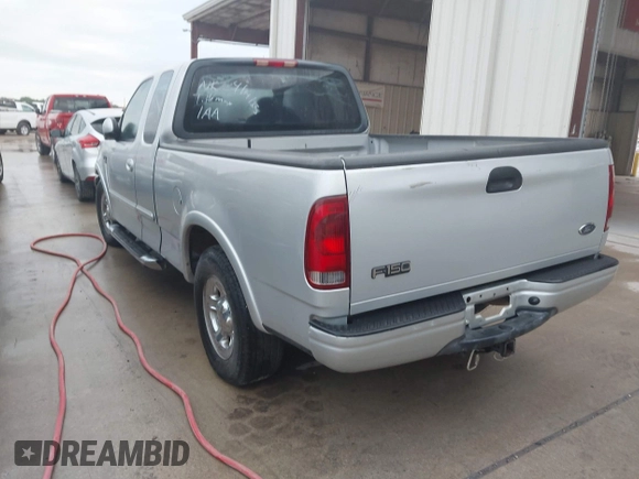 2003 Ford F-150 XL with VIN 2FTRX17223CA73626, listed as a IAAI auction lot 42027926 with 127,614 mi miles. Bid and sale history available at carsss.com. Image 3.
