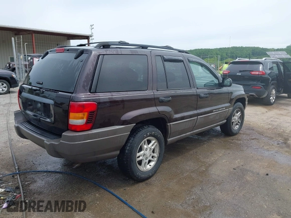 2004 Jeep Grand Cherokee Laredo z VIN 1J4GW48S94C209326, wystawiony jako IAAI lot #42309565 z przebiegiem 159 429 mil mil oraz . Historia ofert i sprzedaży dostępna na DreamBid. Obrazek 4.