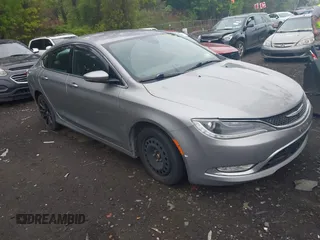 2015 Chrysler 200 C with VIN 1C3CCCCG0FN524571, listed as a IAAI auction lot 42194126 with 157,125 mi miles. Bid and sale history available at carsss.com. Image 1.