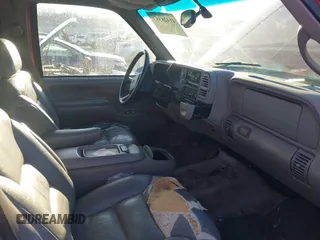 1999 Chevrolet Suburban with VIN 1GNGK26J8XJ377255, listed as a IAAI auction lot 41428307 with 250,000 mi miles. Bid and sale history available at carsss.com. Image 4.