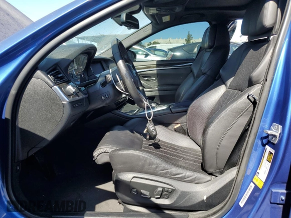 2016 BMW M5 with VIN WBSFV9C57GG343387, listed as a Copart auction lot 73416564 with 71,131 mi miles and Salvage Title. Bid and sale history available at carsss.com. Image 7.
