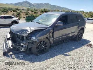 2018 Jeep Grand Cherokee Altitude with VIN 1C4RJFAG5JC320742, listed as a Copart auction lot 56988195 with 140,320 mi miles and Salvage title. Bid and sale history available at DreamBid. Image 1.