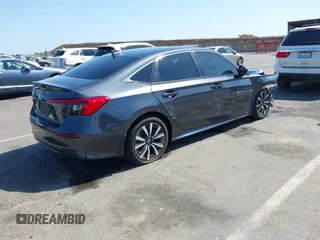 2023 Honda Civic EX with VIN 2HGFE1F74PH323979, listed as a IAAI auction lot 42499373 with 70,326 mi miles and . Bid and sale history available at DreamBid. Image 4.