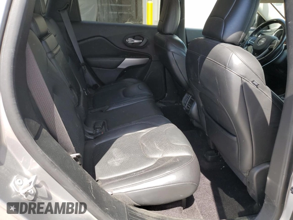 2016 Jeep Cherokee Overland z VIN 1C4PJMJSXGW300719, wystawiony jako Copart lot #58216665 z przebiegiem 128 016 mil mil oraz Szkoda całkowita • Salvage title. Historia ofert i sprzedaży dostępna na DreamBid. Obrazek 11.