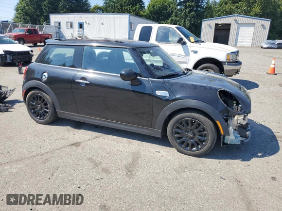 2016 MINI Hardtop S with VIN WMWXP7C5XG3B33500, listed as a Copart auction lot 65537105 with 114,984 mi miles and Salvage title. Bid and sale history available at DreamBid. Image 4.