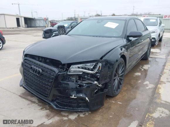 2013 Audi A8 L 4.0L with VIN WAUR2AFDXDN017895, listed as a IAAI auction lot 41609142 with 104,744 mi miles. Bid and sale history available at carsss.com. Image 2.