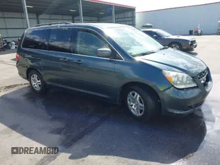 2006 Honda Odyssey EX z VIN 5FNRL38436B082923, wystawiony jako IAAI lot #41940119 z przebiegiem 203 379 mil mil oraz . Historia ofert i sprzedaży dostępna na DreamBid. Obrazek 1.