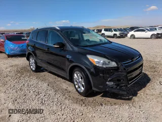 2014 Ford Escape Titanium with VIN 1FMCU9JX5EUC66899, listed as a Copart auction lot 48939795 with 125,814 mi miles and Salvage Title. Bid and sale history available at carsss.com. Image 4.