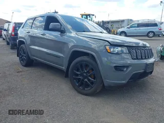 2019 Jeep Grand Cherokee Laredo E with VIN 1C4RJFAGXKC805332, listed as a IAAI auction lot 42330678 with 65,466 mi miles and . Bid and sale history available at DreamBid. Image 1.