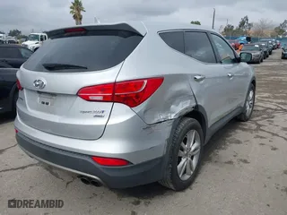 2013 Hyundai Santa Fe 2.0T Sport with VIN 5XYZWDLA6DG069082, listed as a IAAI auction lot 41521260 with 98,580 mi miles. Bid and sale history available at carsss.com. Image 4.