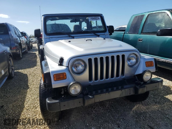 2004 Jeep Wrangler Sport with VIN 1J4FA49SX4P776775, listed as a Copart auction lot 74946824 with Not Provided miles and Salvage Title. Bid and sale history available at carsss.com. Image 5.