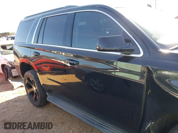 2015 Chevrolet Tahoe LT with VIN 1GNSCBKC5FR156050, listed as a IAAI auction lot 41486815 with 220,599 mi miles and . Bid and sale history available at DreamBid. Image 13.