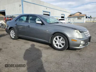 2005 Cadillac STS with VIN 1G6DW677950223170, listed as a Copart auction lot 43663725 with 237,730 mi miles and Salvage Title. Bid and sale history available at DreamBid. Image 4.