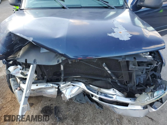 2001 Chevrolet Tahoe LS z VIN 1GNEC13T81J239680, wystawiony jako Copart lot #59090885 z przebiegiem 280 048 mil mil oraz Szkoda całkowita • Salvage title. Historia ofert i sprzedaży dostępna na DreamBid. Obrazek 12.