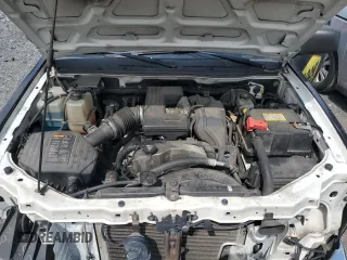 2012 Chevrolet Colorado z VIN 1GBGSBFE2C8157062, wystawiony jako Copart lot #69809394 z przebiegiem 146 370 mil mil oraz Szkoda całkowita • Salvage title. Historia ofert i sprzedaży dostępna na DreamBid. Obrazek 11.
