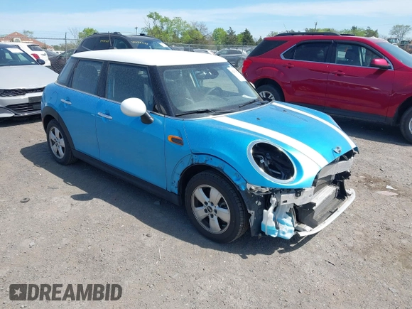 2017 MINI Hardtop 4 Door Cooper with VIN WMWXU1C32H2F78602, listed as a IAAI auction lot 42076854 with 43,270 mi miles and . Bid and sale history available at DreamBid. Image 1.