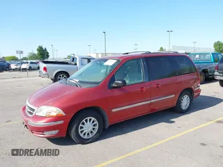 1999 Ford Windstar SE z VIN 2FMZA5242XBB02440, wystawiony jako IAAI lot #42506624 z przebiegiem 157 395 mil mil oraz . Historia ofert i sprzedaży dostępna na DreamBid. Obrazek 2.
