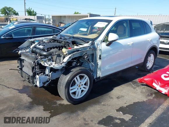 2016 Porsche Cayenne Turbo S E-Hybrid with VIN WP1AA2A21GKA13141, listed as a IAAI auction lot 42666706 with 30,889 mi miles and . Bid and sale history available at DreamBid. Image 2.