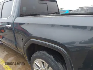 2020 GMC Sierra 1500 Denali z VIN 1GTU9FEL1LZ120581, wystawiony jako IAAI lot #41428827 z przebiegiem 97 917 mil mil oraz . Historia ofert i sprzedaży dostępna na DreamBid. Obrazek 17.