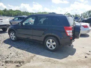 2009 Suzuki Grand Vitara with VIN JS3TD047994100405, listed as a Copart auction lot 62215355 with 127,756 mi miles and Clean title. Bid and sale history available at DreamBid. Image 2.