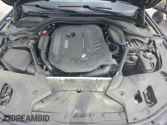 2018 BMW 5 Series 540i with VIN WBAJE5C54JWA93338, listed as a Copart auction lot 54312385 with 77,537 mi miles and Salvage title. Bid and sale history available at DreamBid. Image 11.