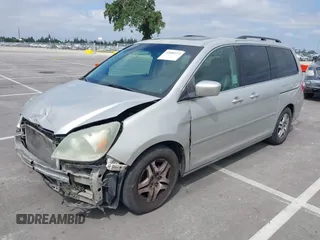 2005 Honda Odyssey EX-L with VIN 5FNRL38745B075486, listed as a IAAI auction lot 42080772 with 197,158 mi miles and . Bid and sale history available at DreamBid. Image 2.