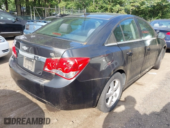 2014 Chevrolet Cruze 1LT with VIN 1G1PC5SB8E7210158, listed as a IAAI auction lot 42729599 with 106,400 mi miles and . Bid and sale history available at DreamBid. Image 4.