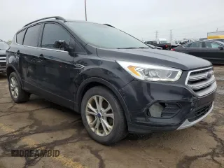 2017 Ford Escape SE z VIN 1FMCU0GD7HUD27649, wystawiony jako Copart lot #57398685 z przebiegiem 117 485 mil mil oraz Czysty tytuł • Clean title. Historia ofert i sprzedaży dostępna na DreamBid. Obrazek 4.